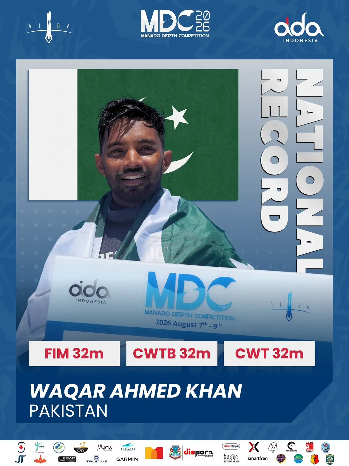 Waqar Ahmed Khan with the Pakistan flag after national records at the Manado Depth Competition